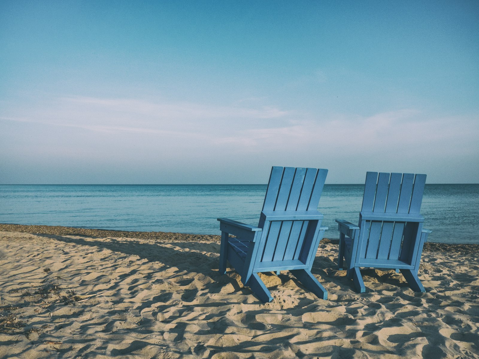 Two chairs facing the sea